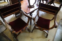 A pair of carved walnut X frame chairs