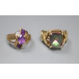 A 9ct gold and tourmaline? dress ring with fancy mount, size L/M and a 9ct gold, amethyst and