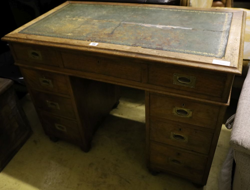 A Victorian walnut military pedestal desk, stamped Arthur Foley & Sons, Salisbury 1894, width