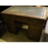 A Victorian walnut military pedestal desk, stamped Arthur Foley & Sons, Salisbury 1894, width