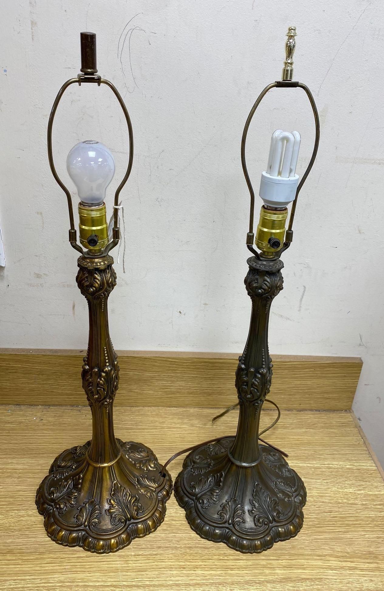 A pair of brass Art Nouveau style lamps