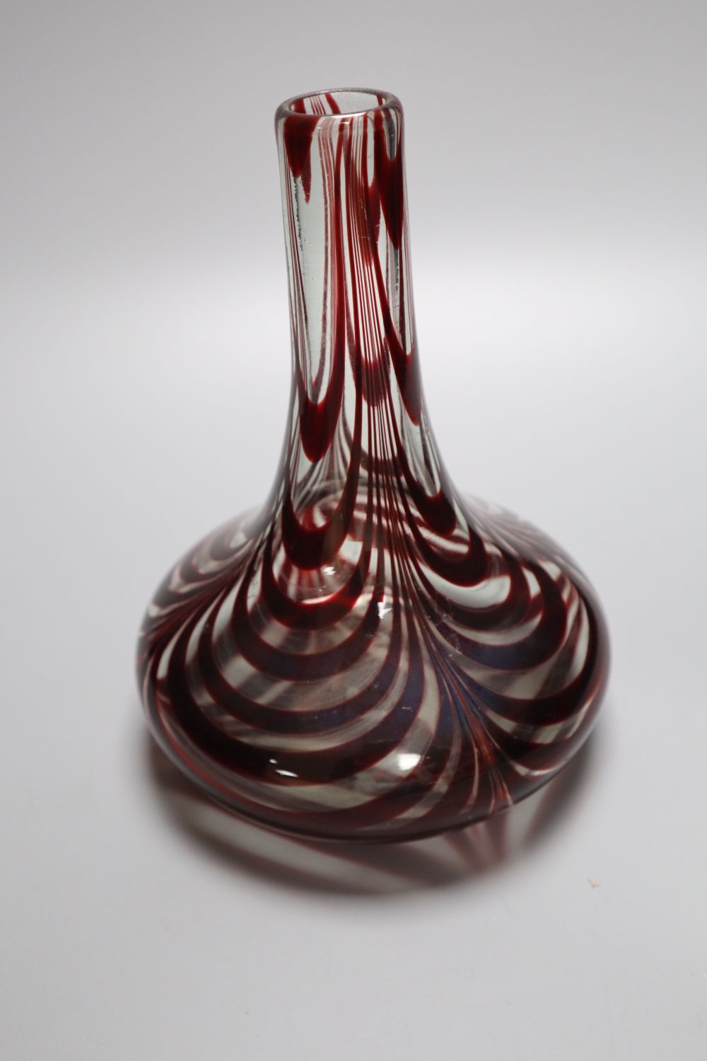 A Victorian red trail glass carafe with bold concentric looped decoration, 20cm highCONDITION: - Image 2 of 3