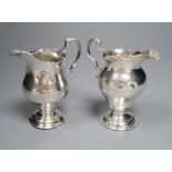 A late George II silver inverted pear shaped cream jug, Stamp & Baker, London, 1759, 10cm and one