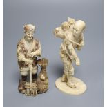 A Japanese ivory okimono of a huntsman with a bound up bear, Meiji period, and a chicken farmer,