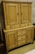 A Victorian pine sideboard with associated cupboard upper section, width 130cm depth 51cm height