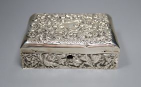 A late Victorian repousse silver mounted lidded rectangular box, with compartmental wooden interior,