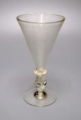 A façon de Venise historismus wine glass, 20th century, the conical bowl above a 'propeller' stem,