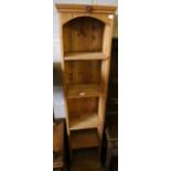 A narrow pine bookcase, width 36cm depth 26cm height 183cm