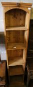 A narrow pine bookcase, width 36cm depth 26cm height 183cm