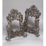 A pair of bronze patinated metal figural photograph frames, height 38cm