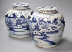 A pair of 18th century Chinese blue and white jars and covers, 23cmCONDITION: One of the covers