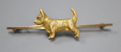 An early 20th century yellow metal, 18ct and rose cut diamond set terrier bar brooch, 63mm, gross