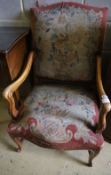 A Louis XIV style tapestry upholstered walnut framed fauteuil, width 62cm height 102cm