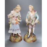 A pair of Continental porcelain figures, height 38cmCONDITION: The base of the gentleman of the pair
