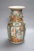 A Chinese Canton famille rose baluster vase, height 33.5cmCONDITION: There is a large area of fine