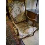 A Louis XVI style tapestry upholstered walnut fauteuil, width 85cm height 116cm