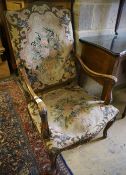 A Louis XVI style tapestry upholstered walnut fauteuil, width 85cm height 116cm