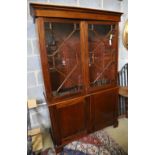 A Georgian style mahogany glazed bookcase, width 116cm, depth 44cm, height 194cm