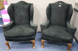 A pair of Queen Anne style upholstered wing armchairs, width 88cm depth 72cm height 108cm