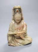 A Chinese soapstone seated figure of Guanyin, 18th century, 10.8cm high