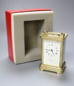 A 20th century lacquered brass carriage timepiece, retailed by Garrard & Co, boxedCONDITION: The