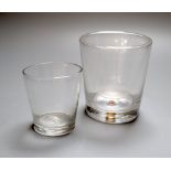 A trick double walled glass tumbler and a dram glass tumbler, 19th and late 18th century, the former