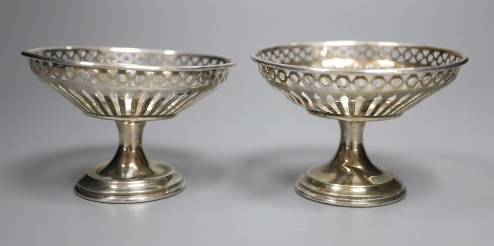 A pair of George V pierced silver bon bon stands, Birmingham, 1910, 56mm, 59 grams.CONDITION: Both