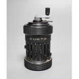 A Curta mechanical calculater, 10.5cmCONDITION: No visible damage.