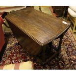 A 1920's oak twist leg gateleg table, width 102cm, depth 54cm, height 72cm