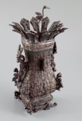 A Chinese Shang style bronze vase and cover, 23.5cm high