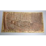A bronze plaque of a boar running through moorland, signed H. Henges, 23.5 x 46.5cm