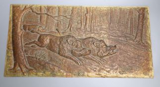 A bronze plaque of a boar running through moorland, signed H. Henges, 23.5 x 46.5cm