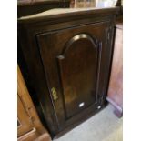 A late 18th century oak hanging corner cupboard, width 66cm depth 31cm height 95cm