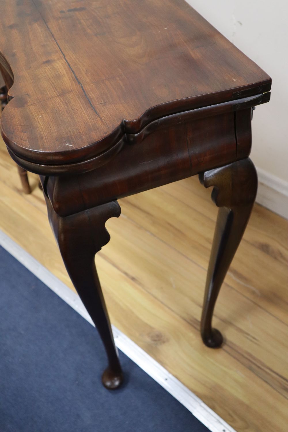 A George I red walnut serpentine top card table, with dished corners, frieze drawer and slender - Image 3 of 3