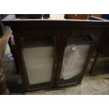 An early 18th century walnut bookcase top, width 100cm height 99cmCONDITION: Right hand glass has