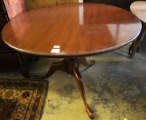 A mahogany snap-top tea table, diameter 106cm height 75cm