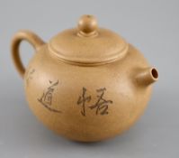 A Chinese Yixing zisha teapot, carved with a scholar, impressed seal of Fan Zhuangnong, 11cm across