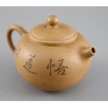 A Chinese Yixing zisha teapot, carved with a scholar, impressed seal of Fan Zhuangnong, 11cm across