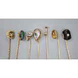 Seven assorted Edwardian gem set stick pins including 18ct and seed pearl, gross 2 grams, 14k and