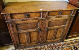 An 18th century style oak sideboard, width 122cm depth 50cm height 86cm