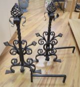 A pair of large Arts & Crafts wrought iron fire dogs, height 72cm