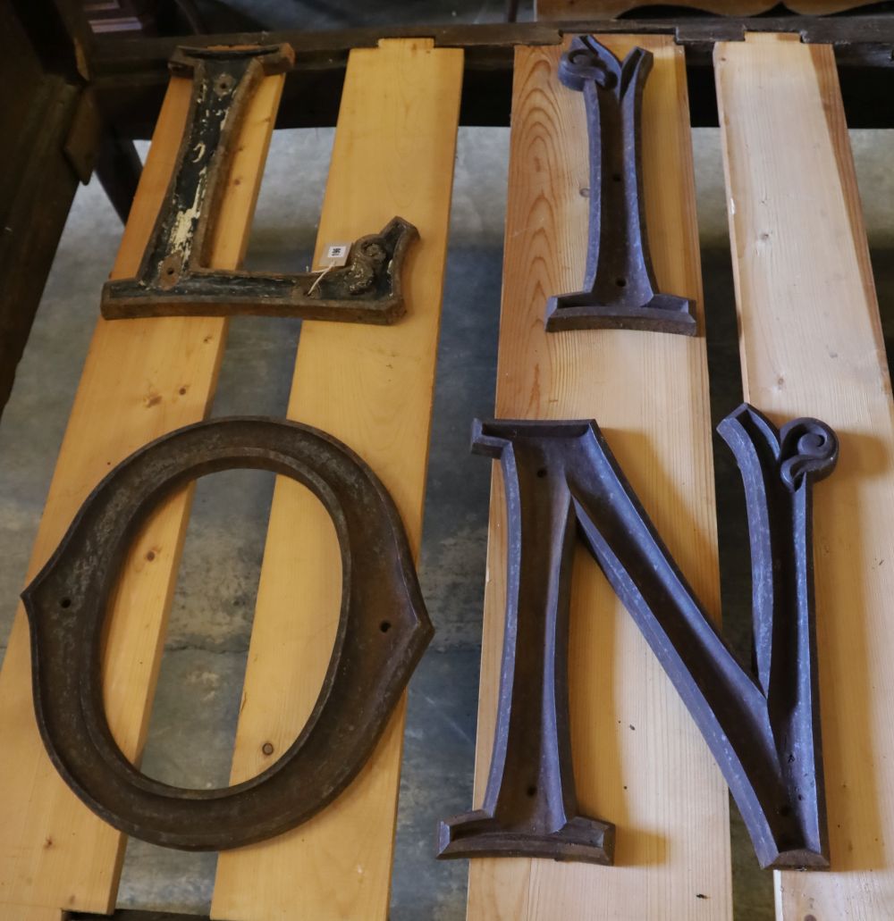 Four Victorian cast iron shop letters LION, largest 53cm high