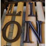 Four Victorian cast iron shop letters LION, largest 53cm high