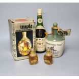 A boxed bottle of Haig Dimple Deluxe Scotch Whisky, a bottle of Uisge Baugh Insh Whiskey and two