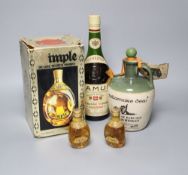 A boxed bottle of Haig Dimple Deluxe Scotch Whisky, a bottle of Uisge Baugh Insh Whiskey and two