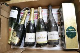 Six bottles of assorted sparkling wines including Moet & Chandon champagne