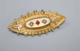 A Victorian 9ct and three stone paste? set navette shaped brooch, 48mm, gross 3.7 grams.CONDITION: