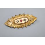 A Victorian 9ct and three stone paste? set navette shaped brooch, 48mm, gross 3.7 grams.CONDITION: