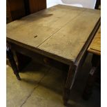 A Victorian pine single drop flap kitchen table, 137 x 83cm height 76cm