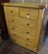 A contemporary six drawer oak chest, width 95cm depth 44cm height 120cm